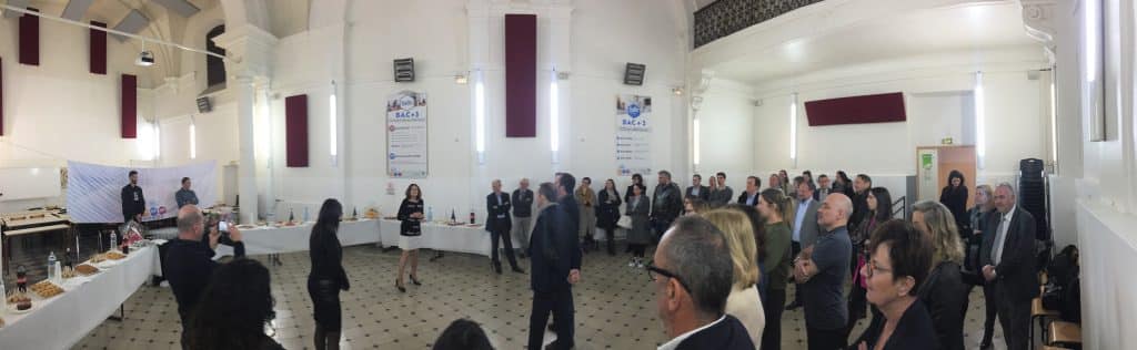 Mme Chassagny devant l'auditoire des responsables d'entreprises